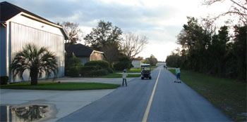 Golf Carts, Rollerblades and Bicycles share a lone taxiway during a weekend afternoon at Spruce Creek